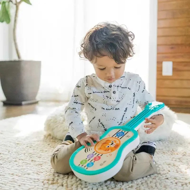 Baby Einstein Sing & Strum Magic Touch Ukulele Wooden Toy (6-36m)